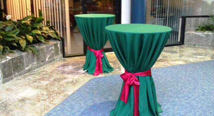 tall-tables-w-green-cloth-red-sash-rentals-mi